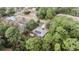 House with solar panels and a greenhouse, seen from above at 8465 Sw 202Nd Ter, Dunnellon, FL 34431