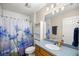 Bathroom with shower/tub combo and vanity at 8465 Sw 202Nd Ter, Dunnellon, FL 34431