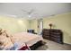 Spacious bedroom with a king-size bed and ample closet space at 8465 Sw 202Nd Ter, Dunnellon, FL 34431