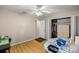 Charming bedroom with hardwood floors and a closet at 8465 Sw 202Nd Ter, Dunnellon, FL 34431