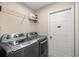 Laundry room with washer, dryer, and shelving at 8465 Sw 202Nd Ter, Dunnellon, FL 34431