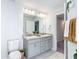 Bathroom with double vanity and separate shower at 9125 Se 47 Court Rd, Ocala, FL 34480