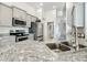 Modern kitchen with stainless steel appliances and granite countertops at 9125 Se 47 Court Rd, Ocala, FL 34480