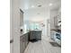 Open concept kitchen with island and stainless steel appliances at 9125 Se 47 Court Rd, Ocala, FL 34480