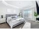 Spacious main bedroom with king-size bed and large window at 9125 Se 47 Court Rd, Ocala, FL 34480