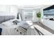 Bright and airy main bedroom with king bed and access to a balcony at 9125 Se 47 Court Rd, Ocala, FL 34480