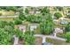An aerial view showcasing the property's location in a lush, green neighborhood at 963 Nw 65Th St, Ocala, FL 34475