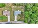 Aerial view of a home showing the well manicured yard and surrounding neighborhood at 963 Nw 65Th St, Ocala, FL 34475
