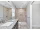 Bathroom with granite countertop and walk-in shower at 963 Nw 65Th St, Ocala, FL 34475