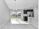 Bright dining area with sliding glass doors leading to backyard at 963 Nw 65Th St, Ocala, FL 34475