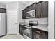 Well-equipped kitchen offering ample cabinet space and granite countertops at 963 Nw 65Th St, Ocala, FL 34475