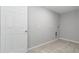 Bright laundry room with tile flooring and shelving at 963 Nw 65Th St, Ocala, FL 34475