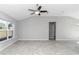 Spacious living room featuring tile floors and high ceilings at 963 Nw 65Th St, Ocala, FL 34475