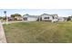 Charming single-story home featuring a two-car garage, well-maintained lawn and a cozy front yard at 9802 Se 178Th Ln, Summerfield, FL 34491
