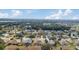 Aerial view of a residential neighborhood with lush landscaping at 9910 Se 138Th Loop, Summerfield, FL 34491
