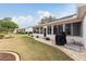 Spacious backyard with screened-in patio and grill area at 9910 Se 138Th Loop, Summerfield, FL 34491