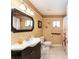 Clean bathroom with single vanity and shower/tub combo at 9910 Se 138Th Loop, Summerfield, FL 34491