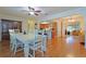 Dining room with hardwood floors and view to living room at 10185 Se 175Th Ln, Summerfield, FL 34491