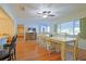 Dining room with hardwood floors and view to living room at 10185 Se 175Th Ln, Summerfield, FL 34491