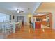 Dining room with hardwood floors and view to kitchen at 10185 Se 175Th Ln, Summerfield, FL 34491