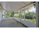Large screened patio perfect for outdoor relaxation and enjoying the view at 10185 Se 175Th Ln, Summerfield, FL 34491