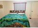 Cozy bedroom with double bed and window coverings at 10736 Sw 62Nd Ave, Ocala, FL 34476