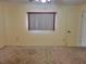 Empty bedroom featuring neutral walls and carpeted floor at 10736 Sw 62Nd Ave, Ocala, FL 34476