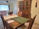 Dining area with wood table and hutch at 10736 Sw 62Nd Ave, Ocala, FL 34476