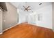 Living room with laminate floors and entryway view at 11540 Se Highway 464, Ocklawaha, FL 32179