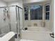 Bathroom with large soaking tub and shower at 11557 Sw 75Th Cir, Ocala, FL 34476