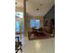 Bright dining room featuring a formal table, chairs, and a hutch at 11557 Sw 75Th Cir, Ocala, FL 34476