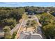 Aerial view of house and waterfront property at 13041 Se 158Th Ln, Weirsdale, FL 32195