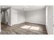 Well-lit bedroom with vinyl wood flooring and neutral tones at 13183 Sw 113Th Place, Dunnellon, FL 34432