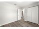 Bedroom with double door closet and wood-look floors at 13183 Sw 113Th Place, Dunnellon, FL 34432