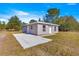 Single-story home with large concrete patio at 13183 Sw 113Th Place, Dunnellon, FL 34432