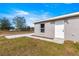 Single-story home with front patio and grassy yard at 13183 Sw 113Th Place, Dunnellon, FL 34432