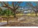 Peaceful park with gazebo, large trees, and lake view at 13183 Sw 113Th Place, Dunnellon, FL 34432