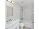 Clean bathroom with a bathtub, white vanity, and marble shower at 14175 Sw 30Th Street Rd, Ocala, FL 34481