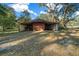 Rustic barn with double doors, ideal for storage at 14221 Ne 47Th Ave, Anthony, FL 32617