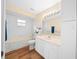 Clean bathroom with tub, toilet, and vanity at 14221 Ne 47Th Ave, Anthony, FL 32617