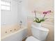 Bathroom with a jetted tub and orchid plant at 14221 Ne 47Th Ave, Anthony, FL 32617