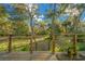 Wooden deck with view of the backyard at 14221 Ne 47Th Ave, Anthony, FL 32617