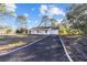 Modern farmhouse exterior with a covered porch at 15002 Sw 27 St, Ocala, FL 34481