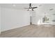 Bright living room with high ceilings and vinyl plank flooring at 15002 Sw 27 St, Ocala, FL 34481