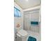 Clean bathroom featuring a toilet and shower stall at 17380 Se 98Th Cir, Summerfield, FL 34491