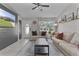 Spacious living room featuring a neutral color palette and large windows at 20 Fir Dr, Ocala, FL 34472