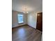 Dining room features chandelier and wood floors at 2191 Ne 40Th St, Ocala, FL 34482