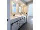 Updated bathroom with double vanity and modern farmhouse style at 2241 Brian Ave, South Daytona, FL 32119