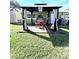 Covered gazebo with seating area and wood deck at 2241 Brian Ave, South Daytona, FL 32119