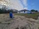 A view of the backyard that shows the exterior of the home at 262 Locust Rd, Ocala, FL 34472